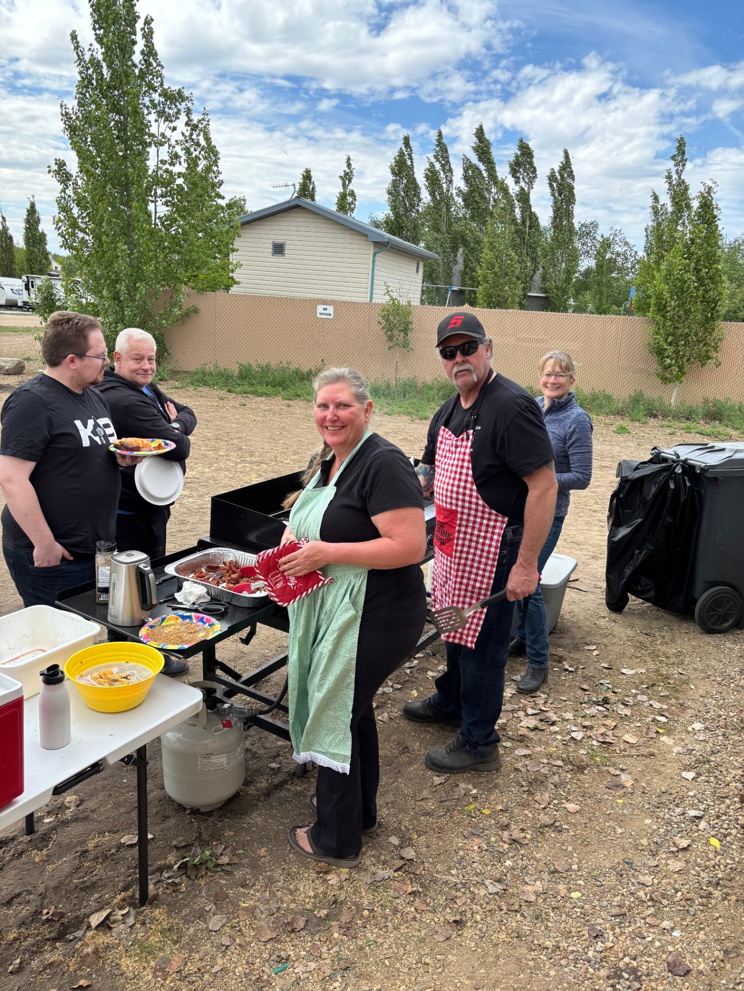 Community BBQ volunteers at work